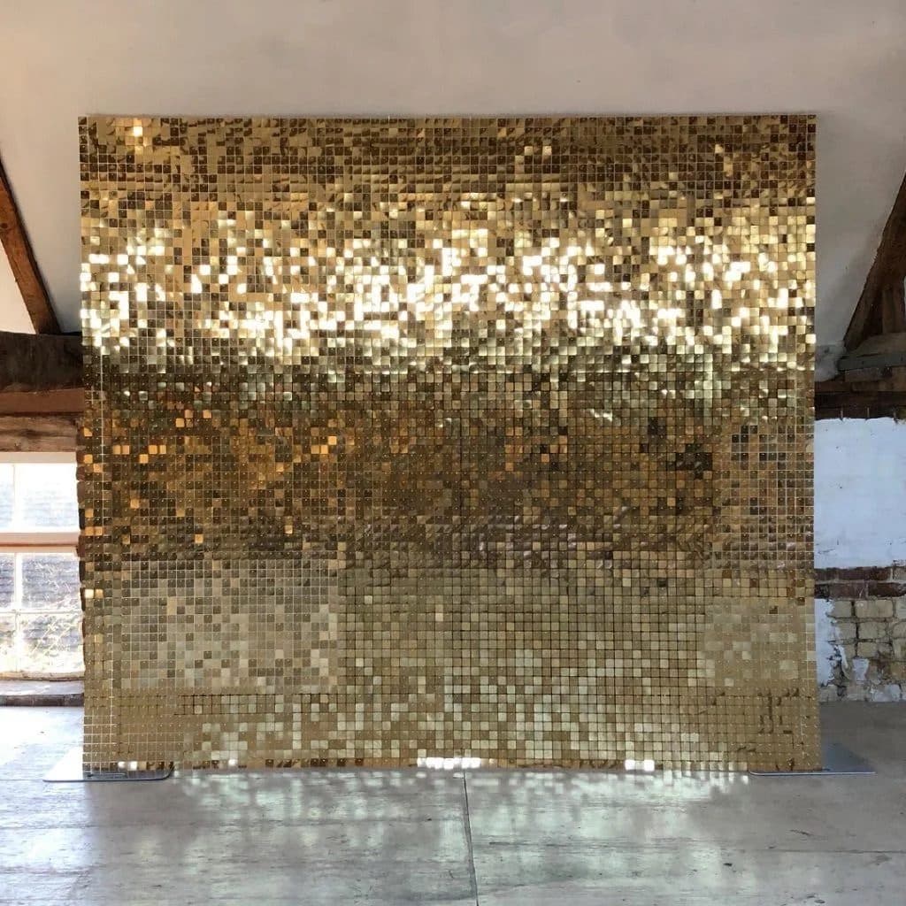 The gold sequin shimmer wall backdrop